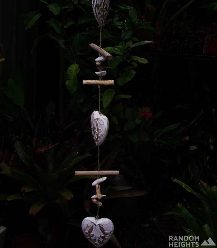 Engraved white Heart hanger in the garden