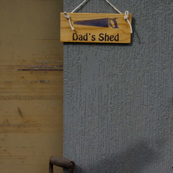 Wooden Dad's Shed Sign with rope on Dad's shed door